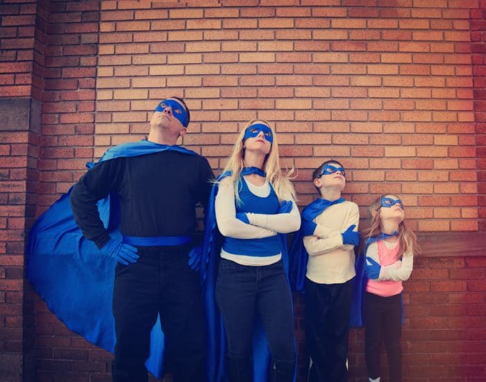 Family dressed in Hero Costumes